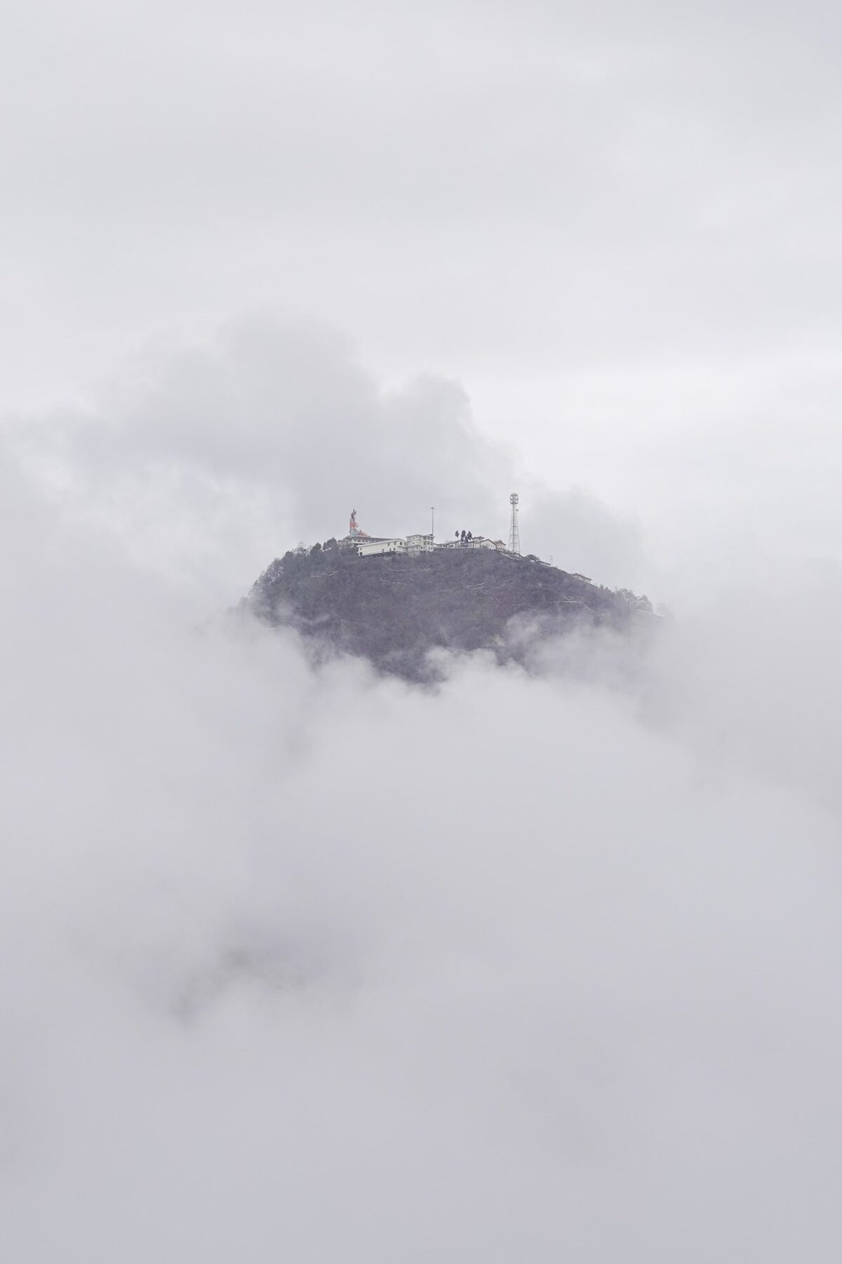 Tara Devi temple above the clouds